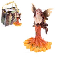 Mini figurine de fée orange avec sac
